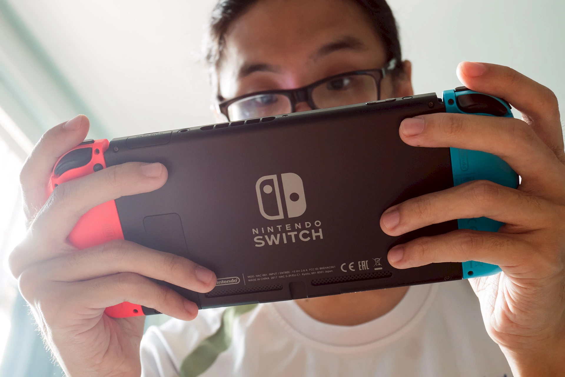Playing Nintendo Switch.